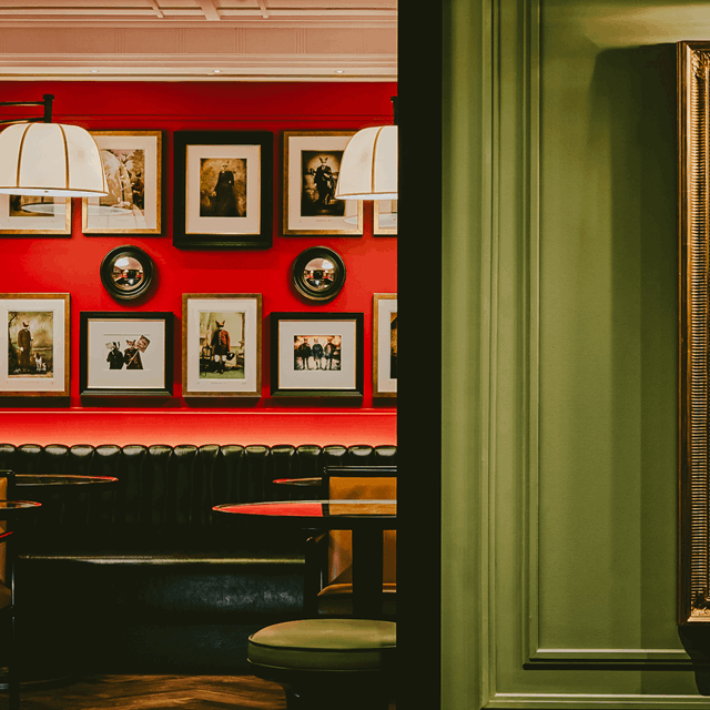 Seating area and portrait on The Lower Ground at The Mayfair Townhouse
