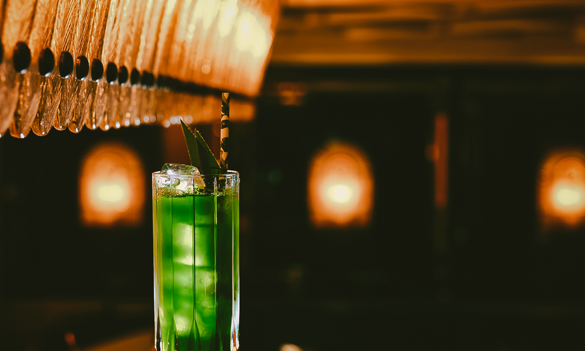 Green coloured cocktail at The Dandy Bar at The Mayfair Townhouse
