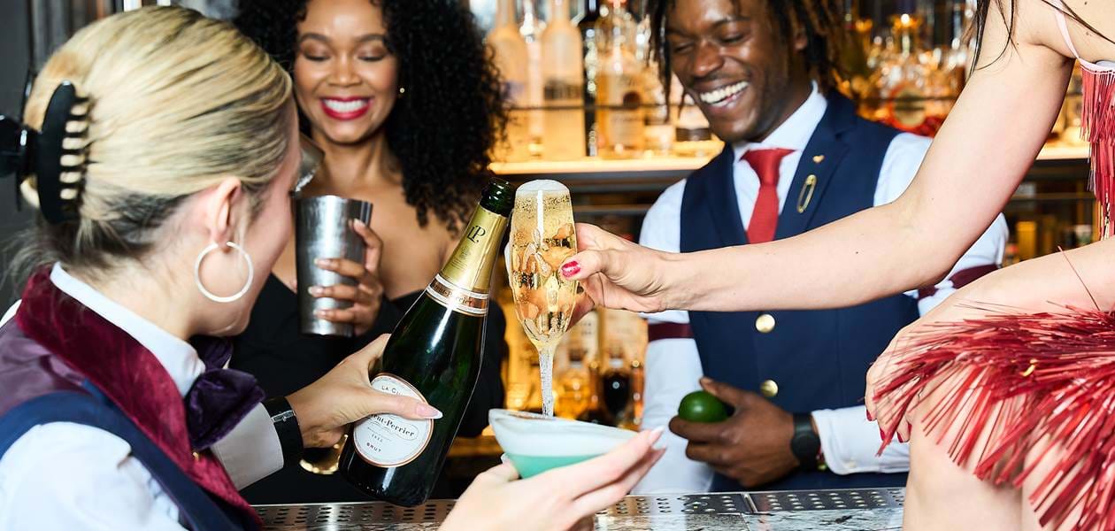 overflowing champagne pour