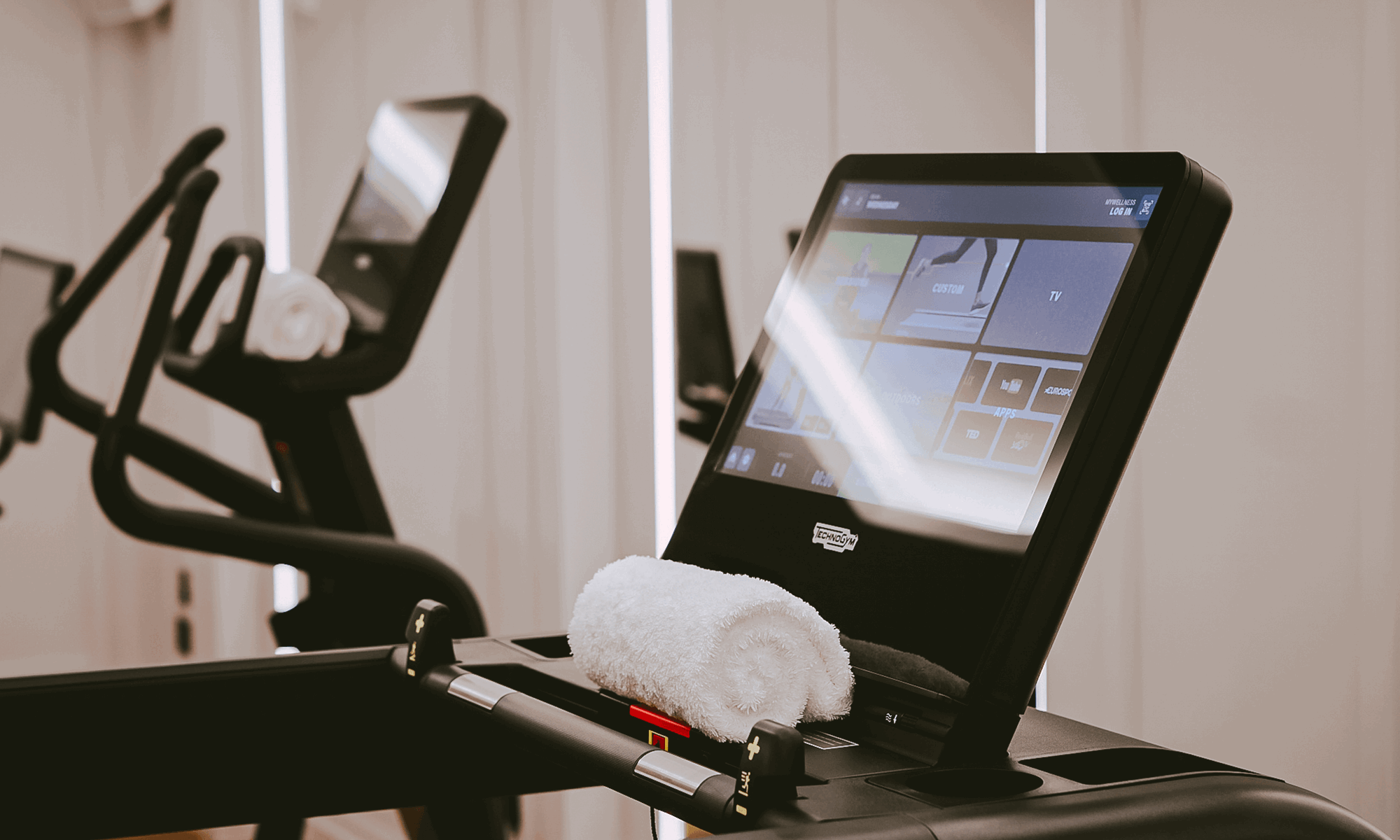 Treadmill and cross trainer inside the fitness suite at The Mayfair Townhouse